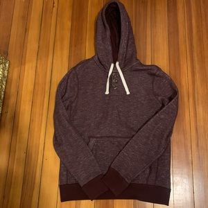 Maroon hoodie with front pocket. Size medium